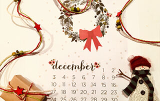 December calendar page decorated with festive ribbons, garland, parcel and snowman