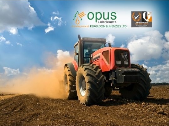 tractor in field on sunny day - opus lubricants agricultural equipment spring 2024